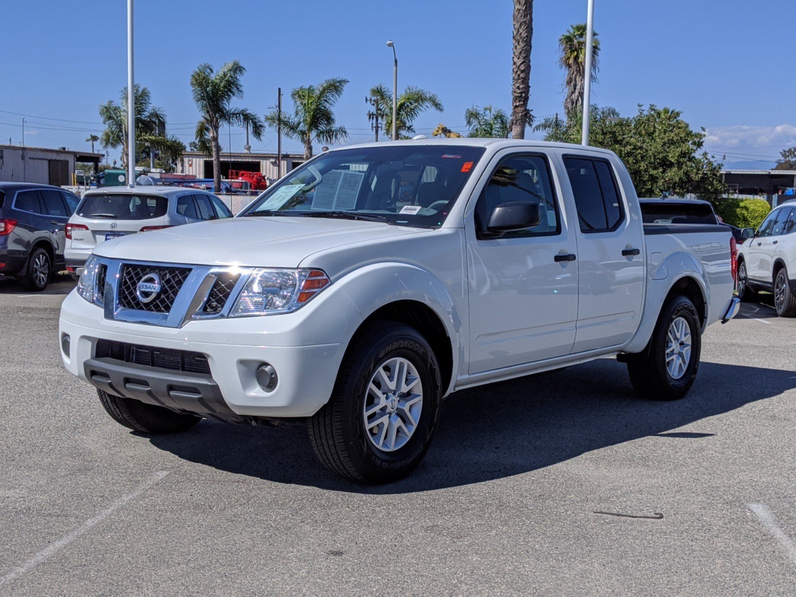 PreOwned 2018 Nissan Frontier SV V6 Crew Cab Pickup in