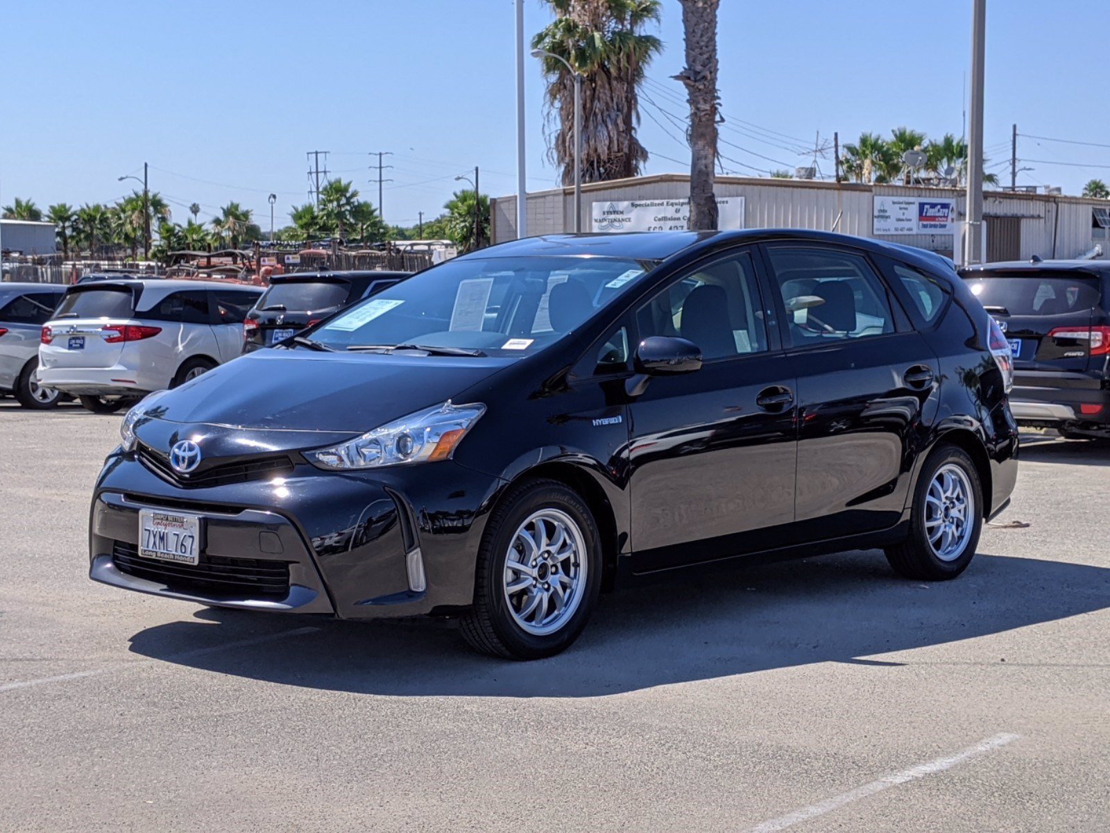 PreOwned 2017 Toyota Prius v Three Station Wagon in